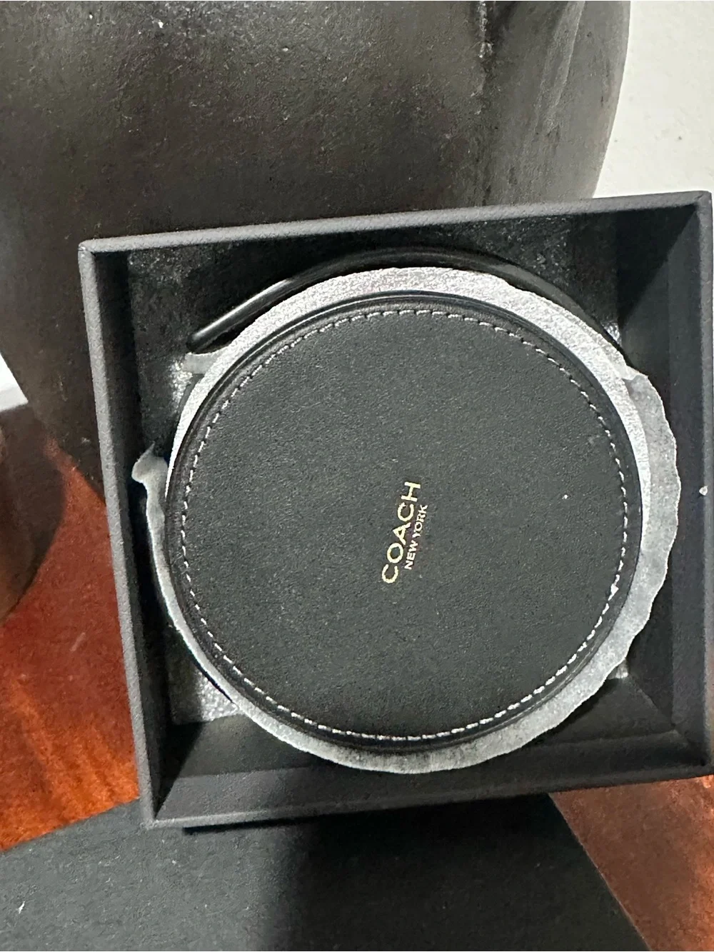 COACH Round Leather Coaster Set in Black, Orange, Red, Green